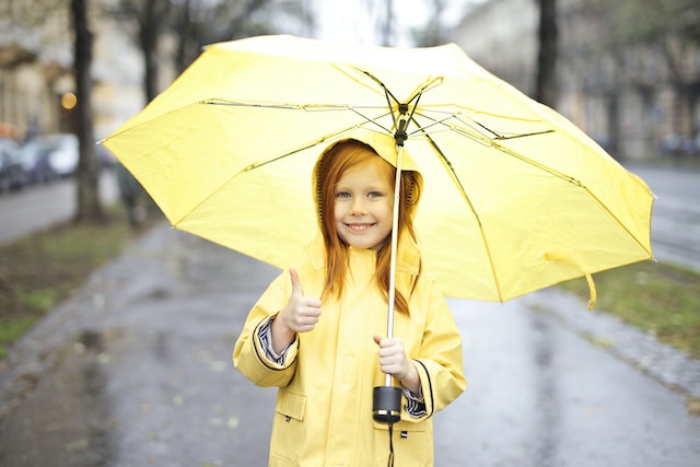 Next Gen personal finance_holding an umbrella